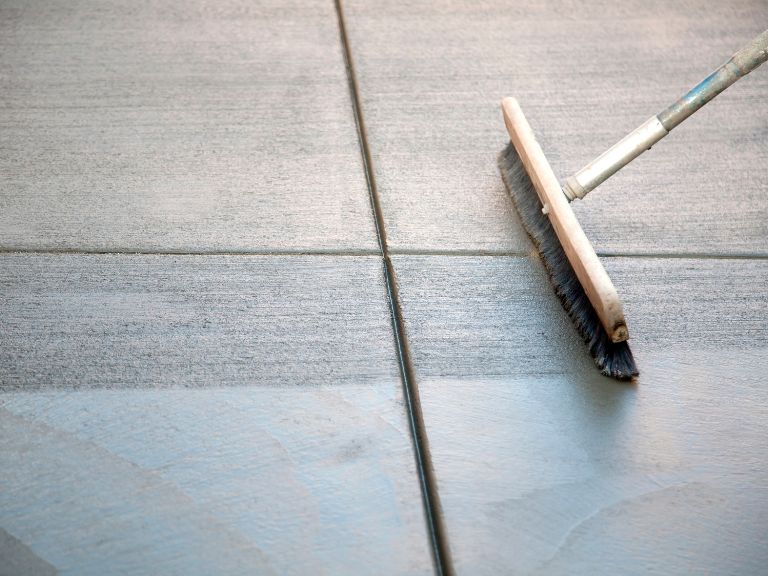 charlotte pro putting on the finish to a new concrete slab