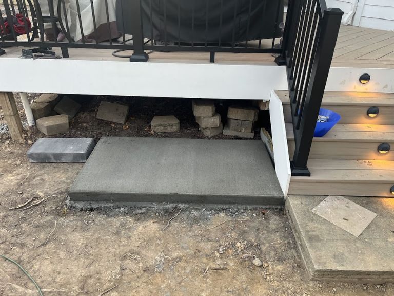 residential-concrete-patio-pad-pour-fort-mill-sc pouring and finishing a new residential concrete pad for a patio in fort mill sc