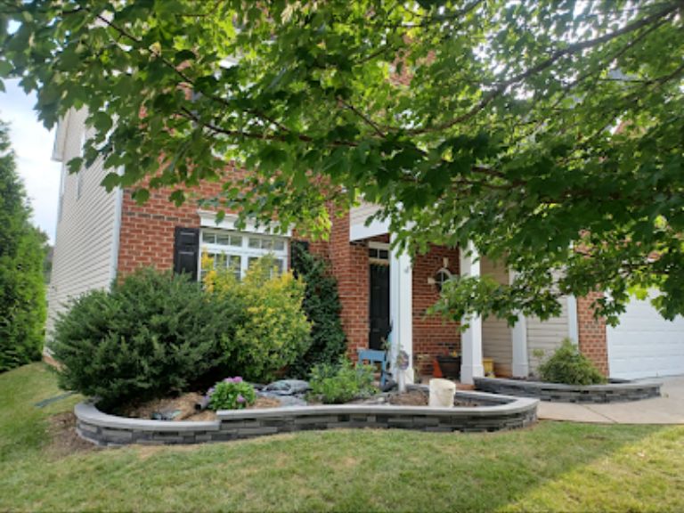 we built a brandon techo-bloc garden bed wall in huntersville nc to define the space, enhance curb appeal, and deliver lasting durability with a natural look.