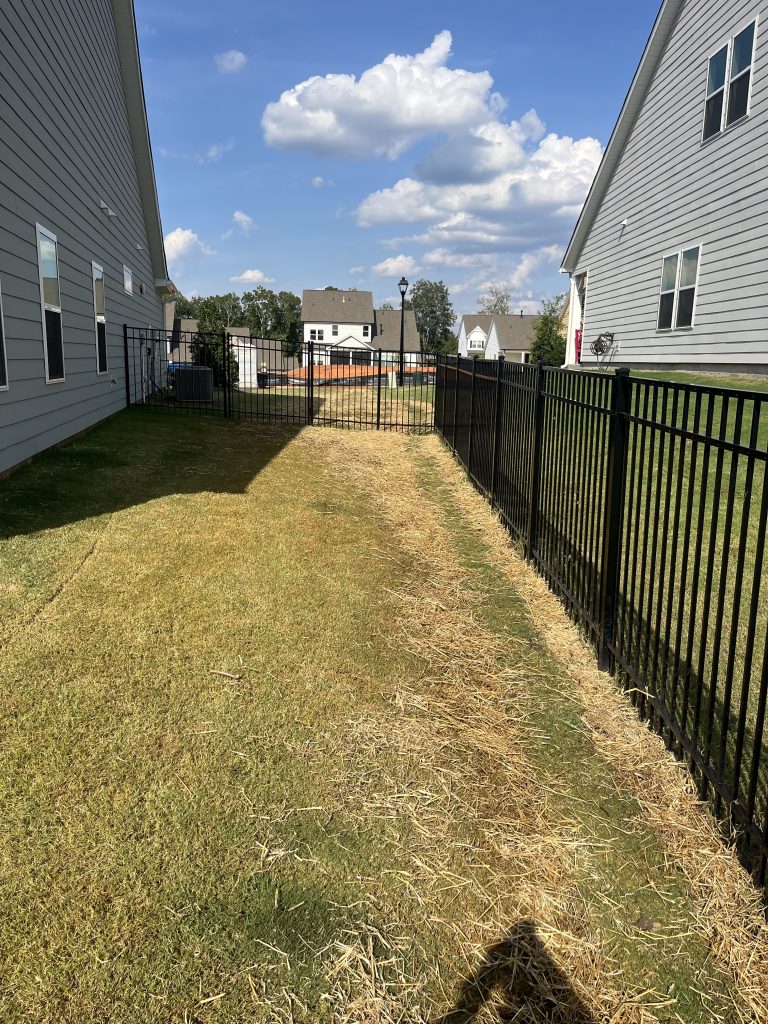 topsoil and bermuda sod finish over french drain trench in lancaster sc yard