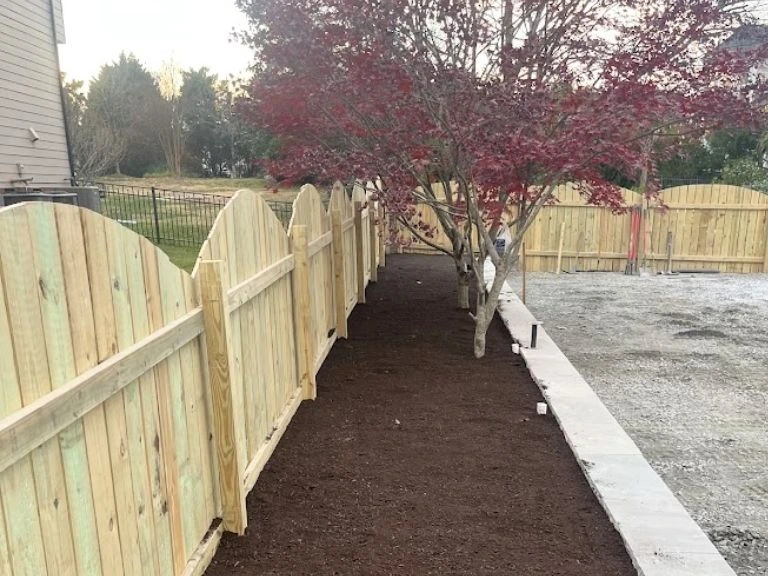 garden bed install during a artificial turf job
