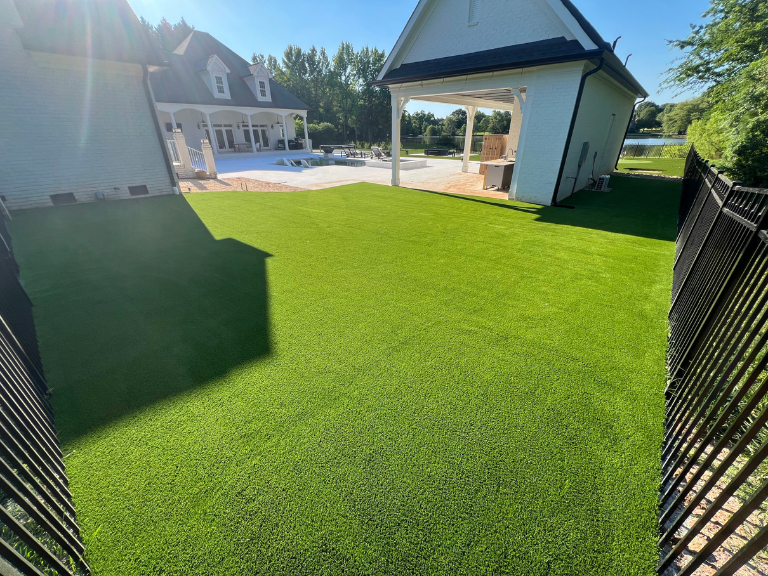 artificial turf running between the house and pool house in weddington, nc