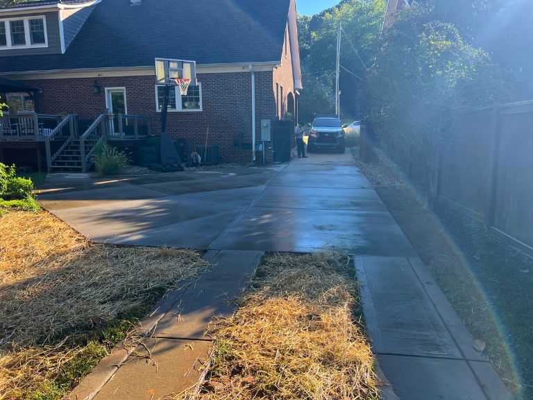 finished concrete driveway extension looking toward the house in grier heights, charlotte, nc